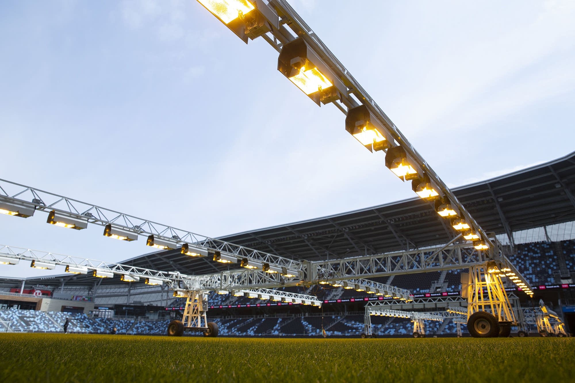 Grow lights are used to help keep the grass green at Allianz Field.