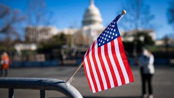 An American flag flies outside the U.S. Capitol on Jan. 9, 2021.