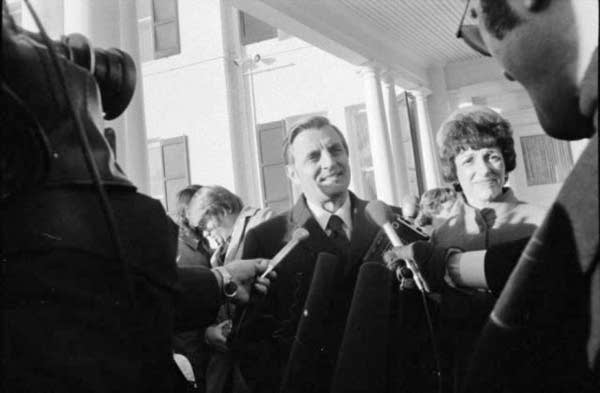 Walter Mondale speaks to reporters on the day of his inauguration.