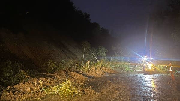 Mud and debris covers a highway
