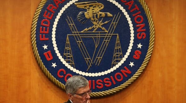 Federal Communications Commission Chairman Tom Wheeler listens to testimony before voting on Net Neutrality at the FCC headquarters February 26, 2015 in Washington, DC.