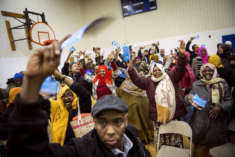 Caucus-goers express support.