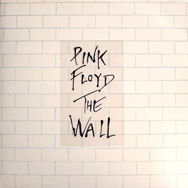 White album cover with bricks design.