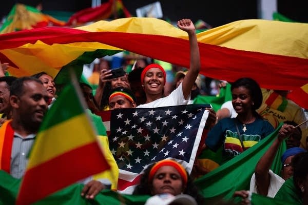 Supporters of Ethiopian Prime Minister Abiy Ahmed cheer.