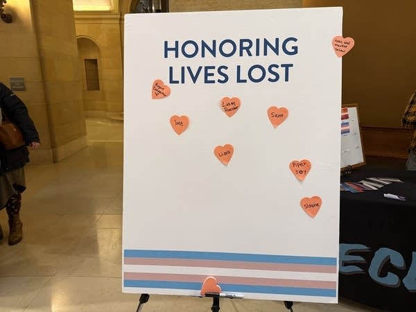 A sign reads "Honoring Lives Lost."