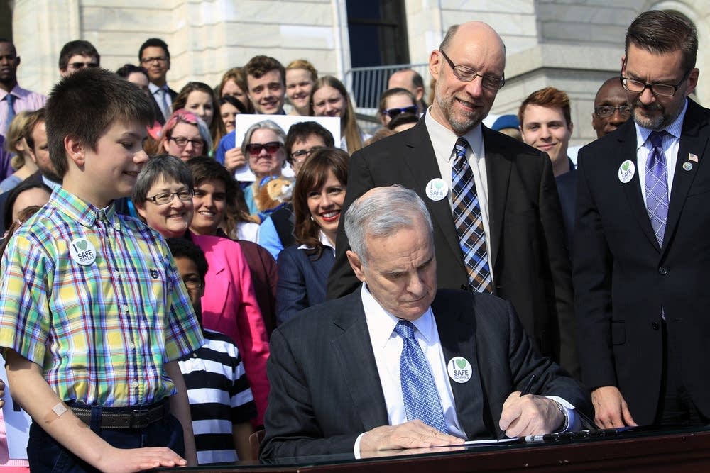 Gov. Mark Dayton signs