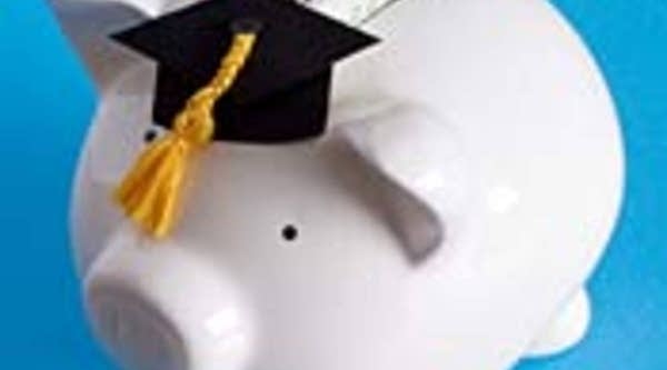 Piggy bank in cap and gown