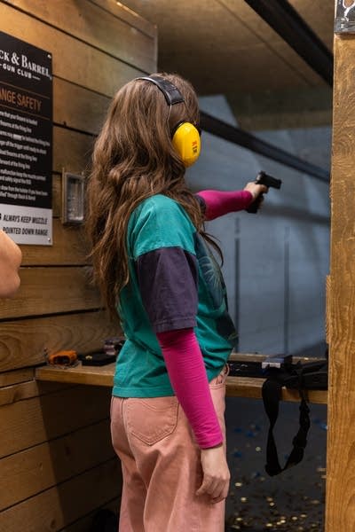 People pose and shoot guns-4