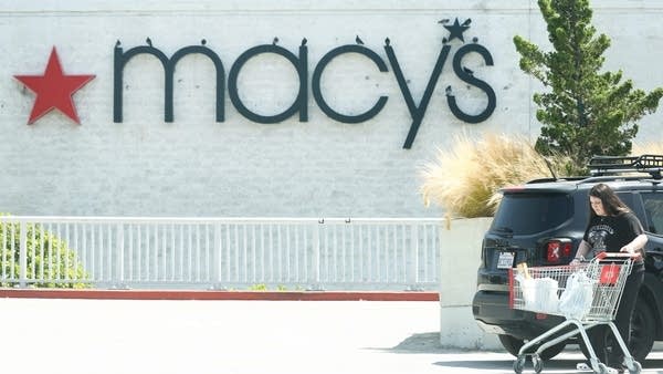 Macy's is among the retailers to issue shaky forecasts as consumers channel spending away from goods toward necessities and experiences.  