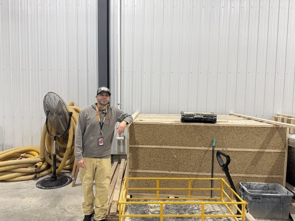A man points to hempcrete-2