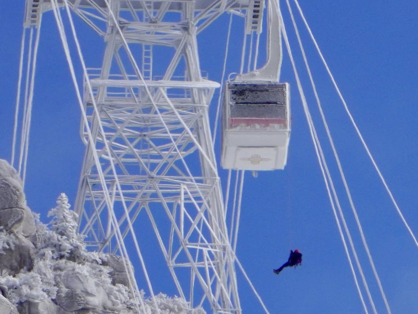 Crews rescue 21 people from stuck mountain tram cars in New Mexico
