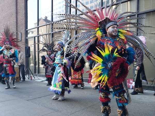 people in costumes dancing
