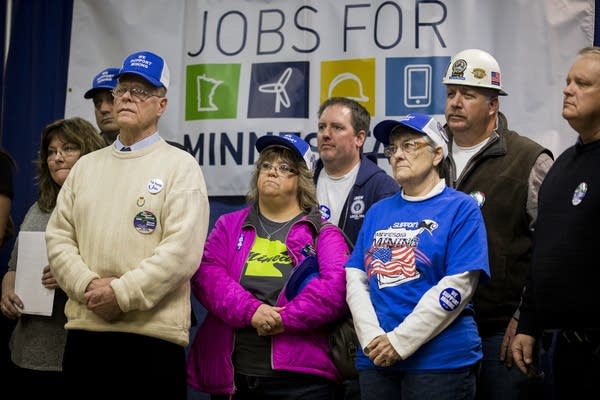 Supporters of Twin Metals listen to speakers