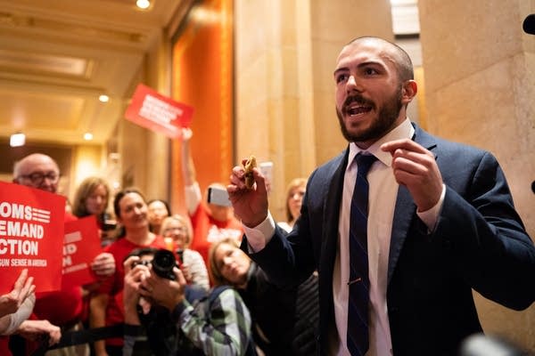 Freshman DFL Rep. Hunter Cantrell speaks to anti-gun violence activists