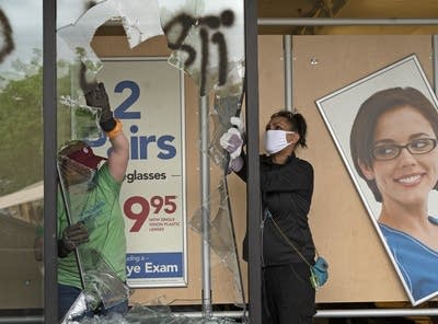 Volunteers help clean up St. Paul's Midway neighborhood.