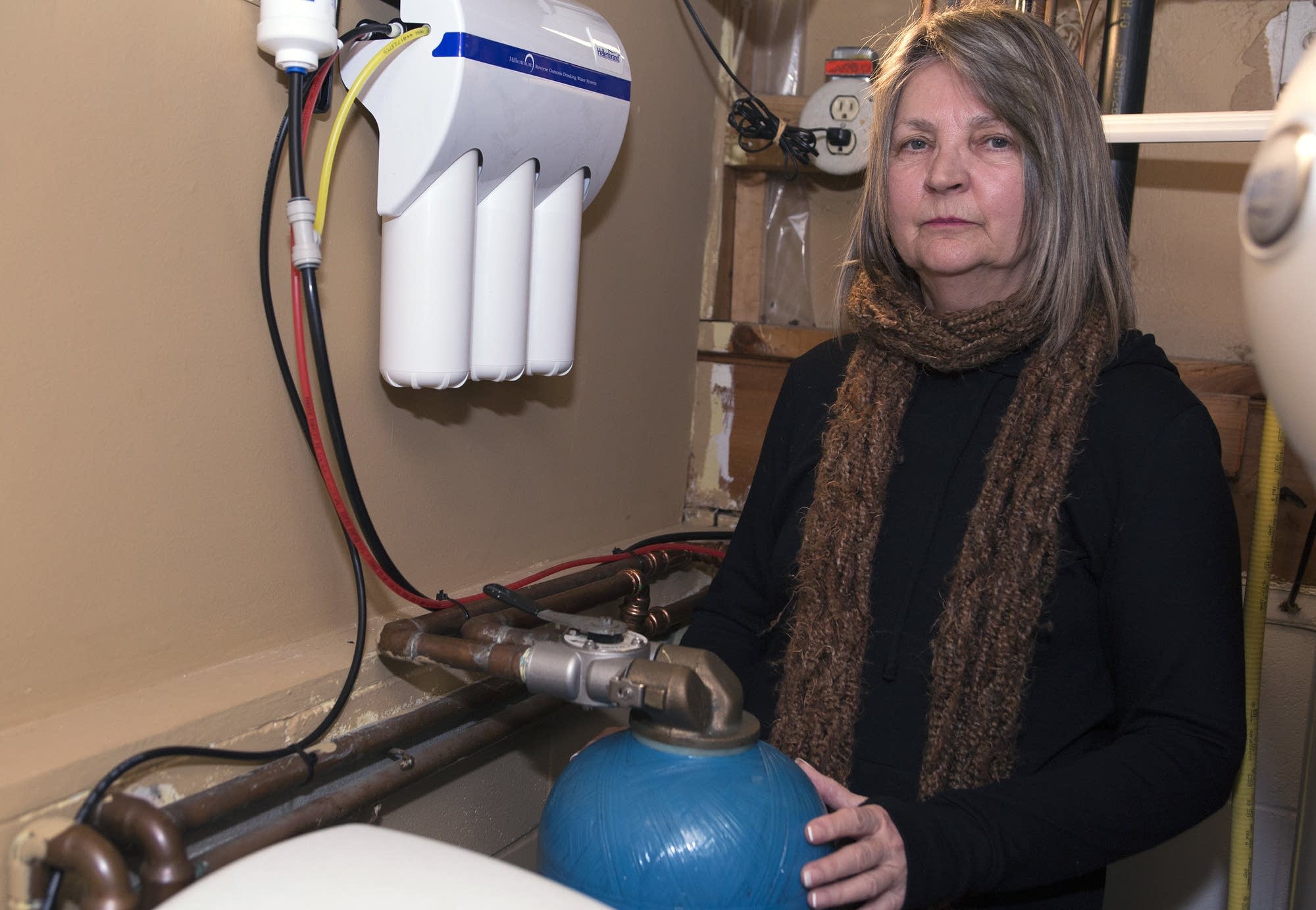 Jane Coy has installed a granular activated carbon filter in her basement.