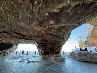 Hikers explore the Apostle Islands ice caves