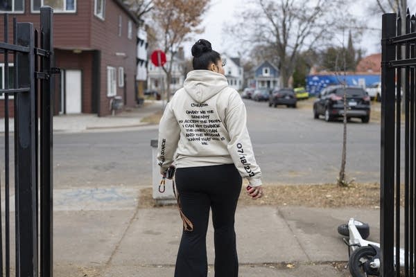 A woman poses for a photograph.