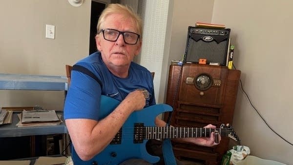 Todd Kneebone loves his electric guitar lessons. Social Security income is the foundation of his retirement budget.