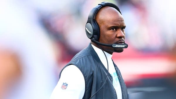 Former Miami Dolphins head coach Brian Flores claims in a lawsuit against the NFL that the Rooney Rule — which requires that one nonwhite candidate be interviewed for head coach positions — is all show.