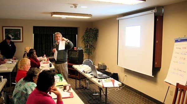 At a Portland, Ore., hotel, William Douglas teaches home-care classes on how to budget personal money and other courses in career and personal development.