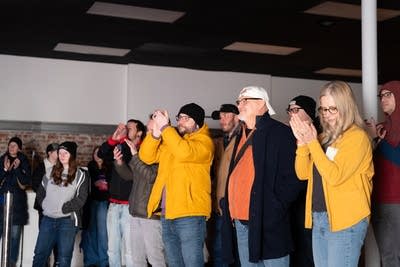 People watching and cheering