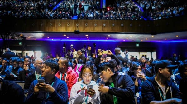 Attendees work on their devices ahead of Apple's annual Worldwide Developers Conference in San Francisco, California on Monday.