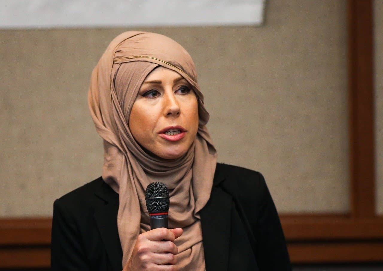 Candidate Regina Mustafa speaks during a forum.