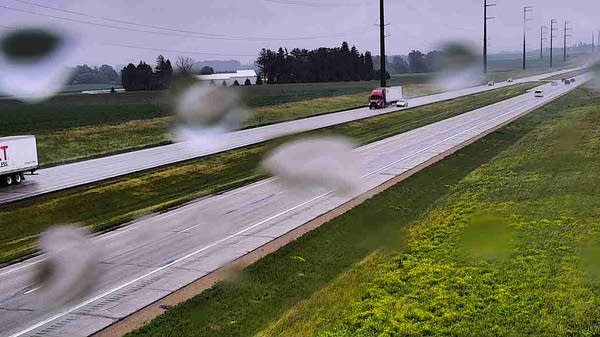 Raindrops on a traffic camera lens