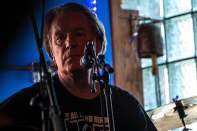 Jim walsh peforming on stage