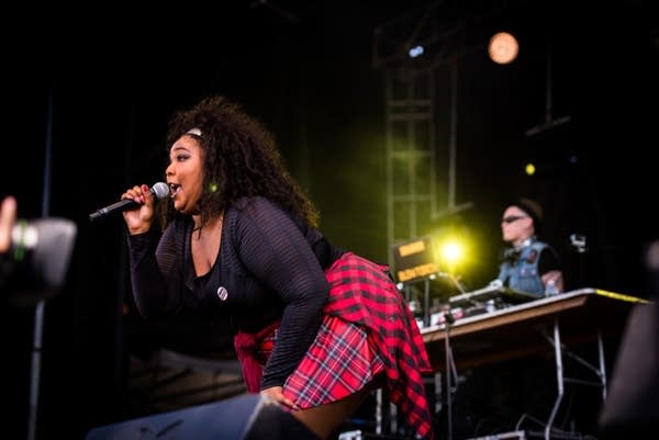 Lizzo performing with GRRRL PRTY at Rock the Garden 2016.