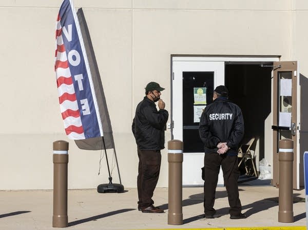 Hired security personnel wait for voters outside the Leon County Supervisor of Elections office on November 3, 2020 in Tallahassee, Florida. 