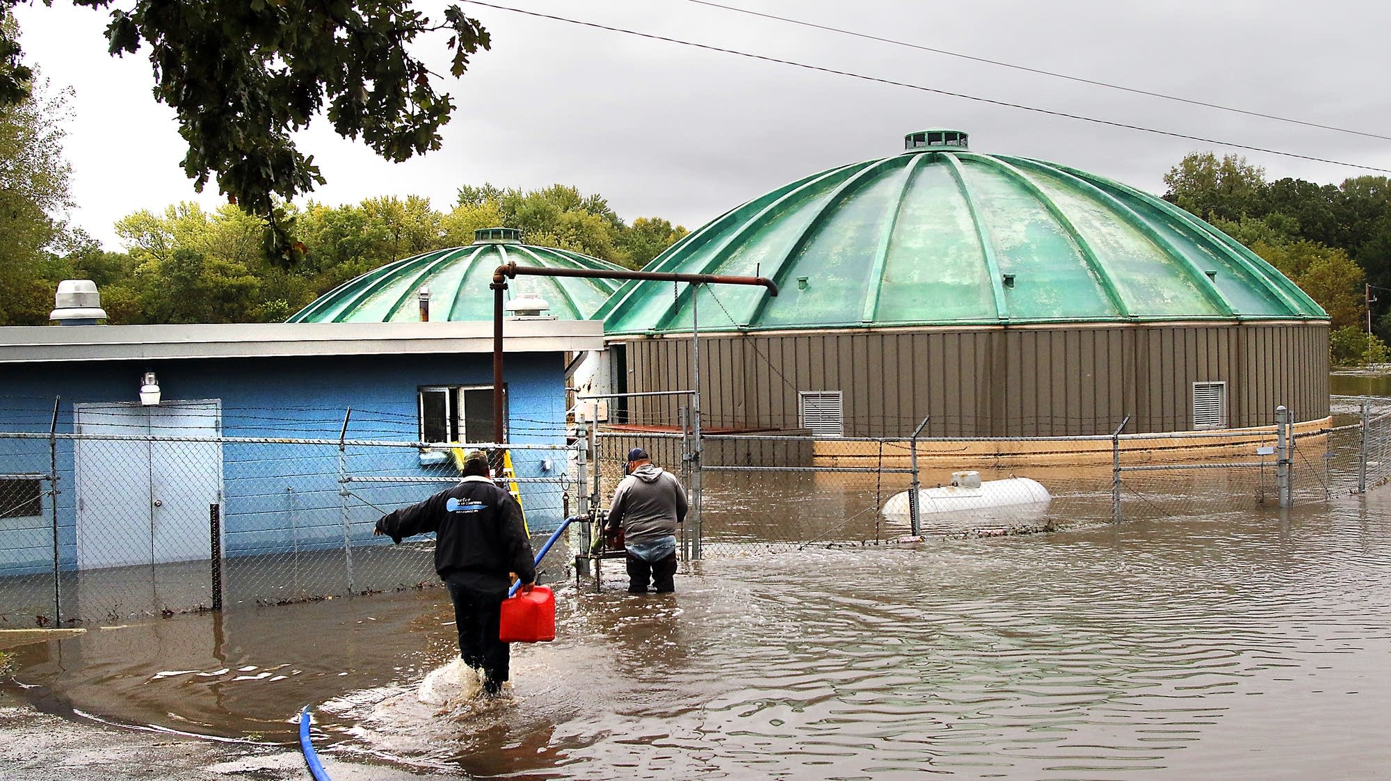 Wanamingo employees clear water from sewage plant