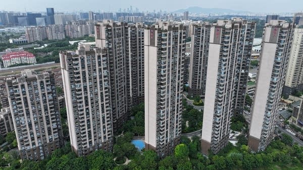 The Evergrande logo is seen on residential buildings in China's eastern Jiangsu province.