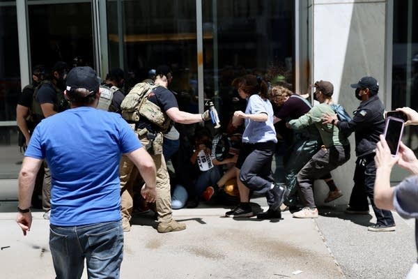 U.S. Marshals pepper spraying protestors