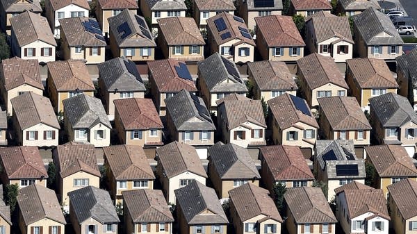An aerial view of suburban homes
