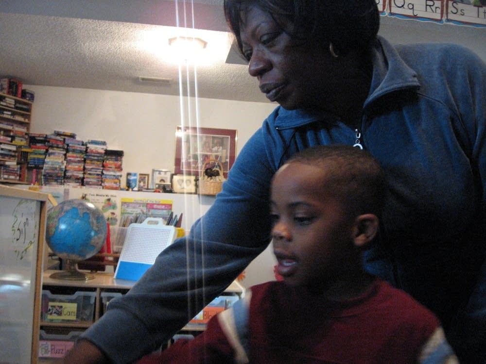 Carolyn with Ishmael at the board