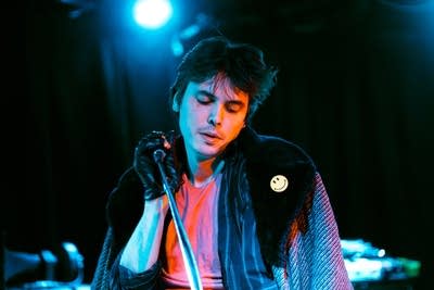 A musician singing onstage