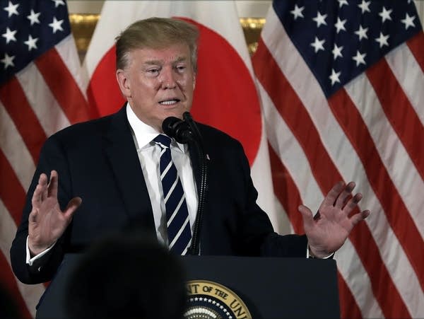 Trump opens state visit, needles Japan over trade issues