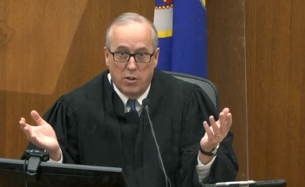 A judge speaks during a trial.