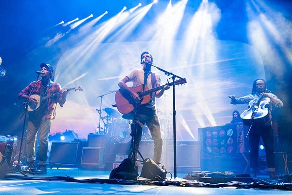The Avett Brothers performing on stage