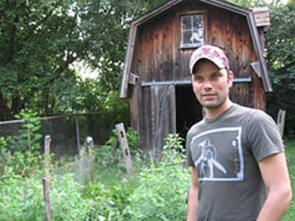 Craig Arveson outside his garden