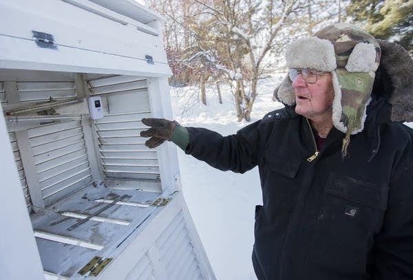 The keeper of the Embarrass, Minn.,  thermometer retires