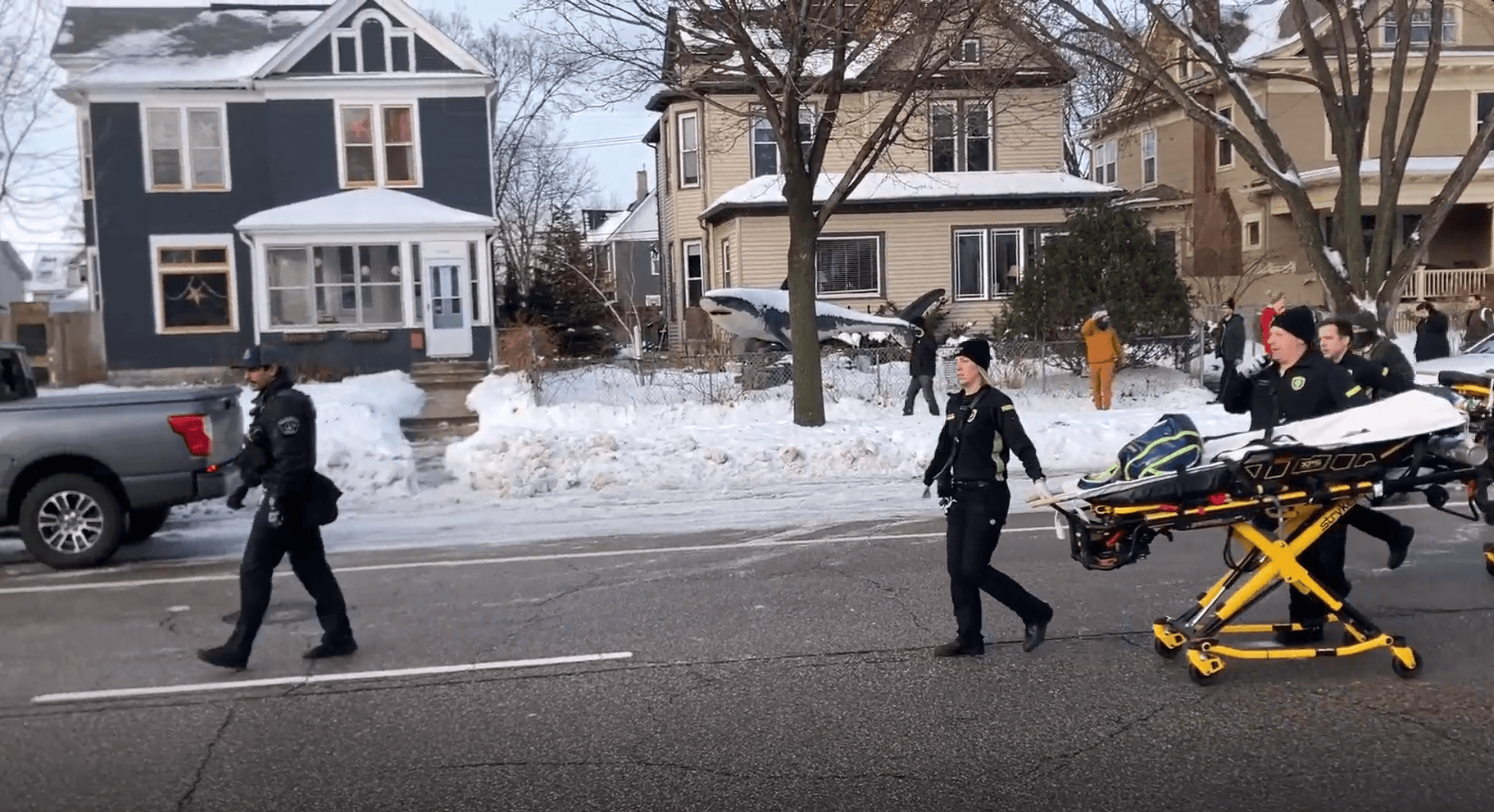 Paramedics wheel someone