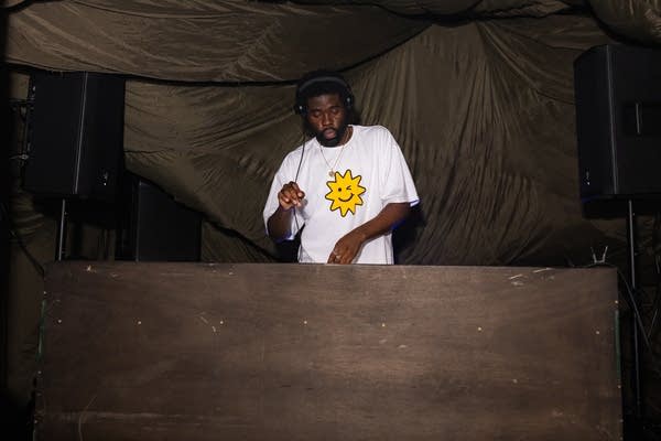 a person djing on stage