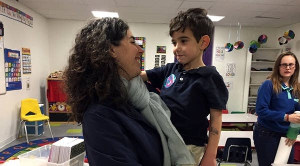 Meredith Chaiken picks up her son Ezra from an after-school program in Baltimore.