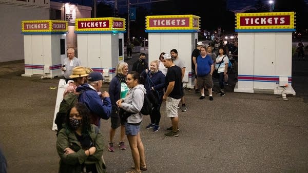 People line up at the gate of the Minnesota State Fair.