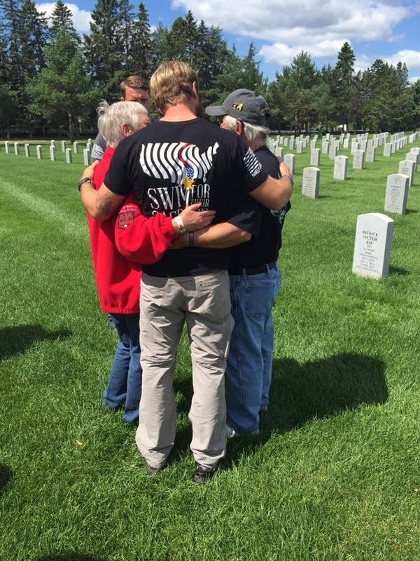 Steady stream of Gold Star families follows river swim