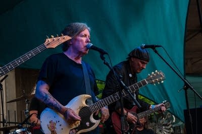 a band performing on an outdoor stage