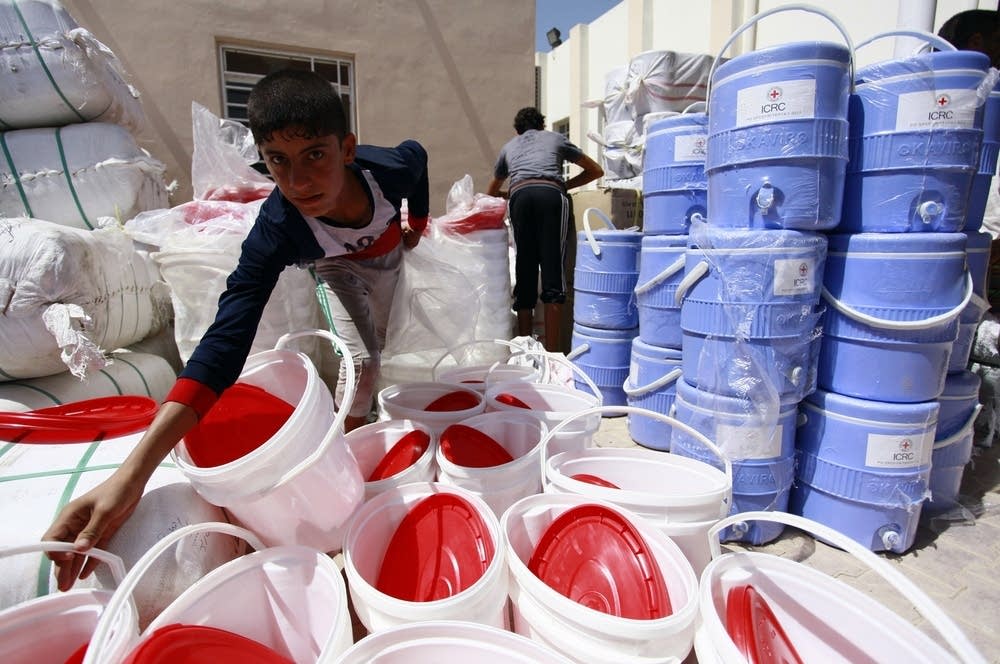 Collecting aid from the International Red Cross
